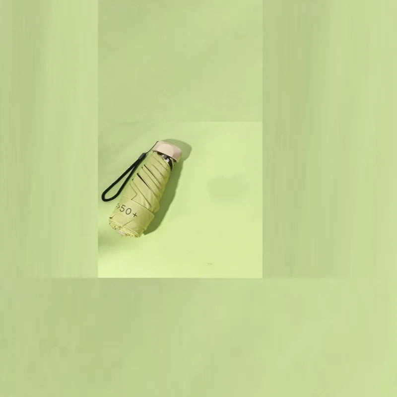 1Pc Mini Sun Umbrella Pocket Rain Umbrella Vinyl Folding UV Ultraviolet Protection Sun Shade Pocket Parasol Capsule