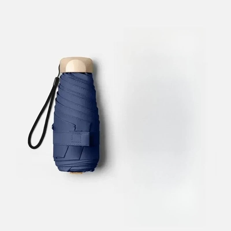 1Pc Mini Sun Umbrella Pocket Rain Umbrella Vinyl Folding UV Ultraviolet Protection Sun Shade Pocket Parasol Capsule